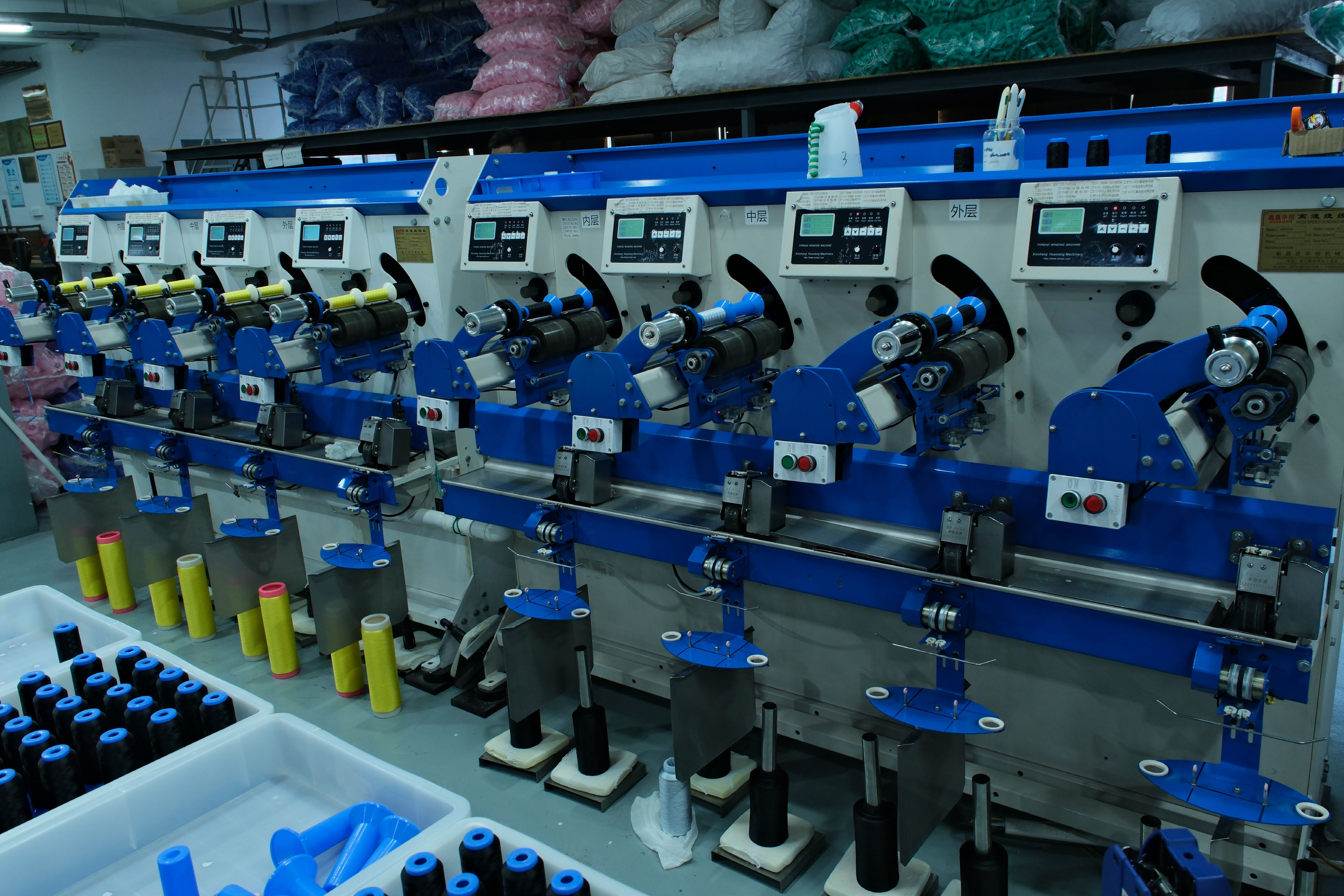 Thread winding equipment at Yusi production base